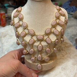 Beautiful faux necklace. Pink faux gem looking pieces. Adju chain 16-18”.